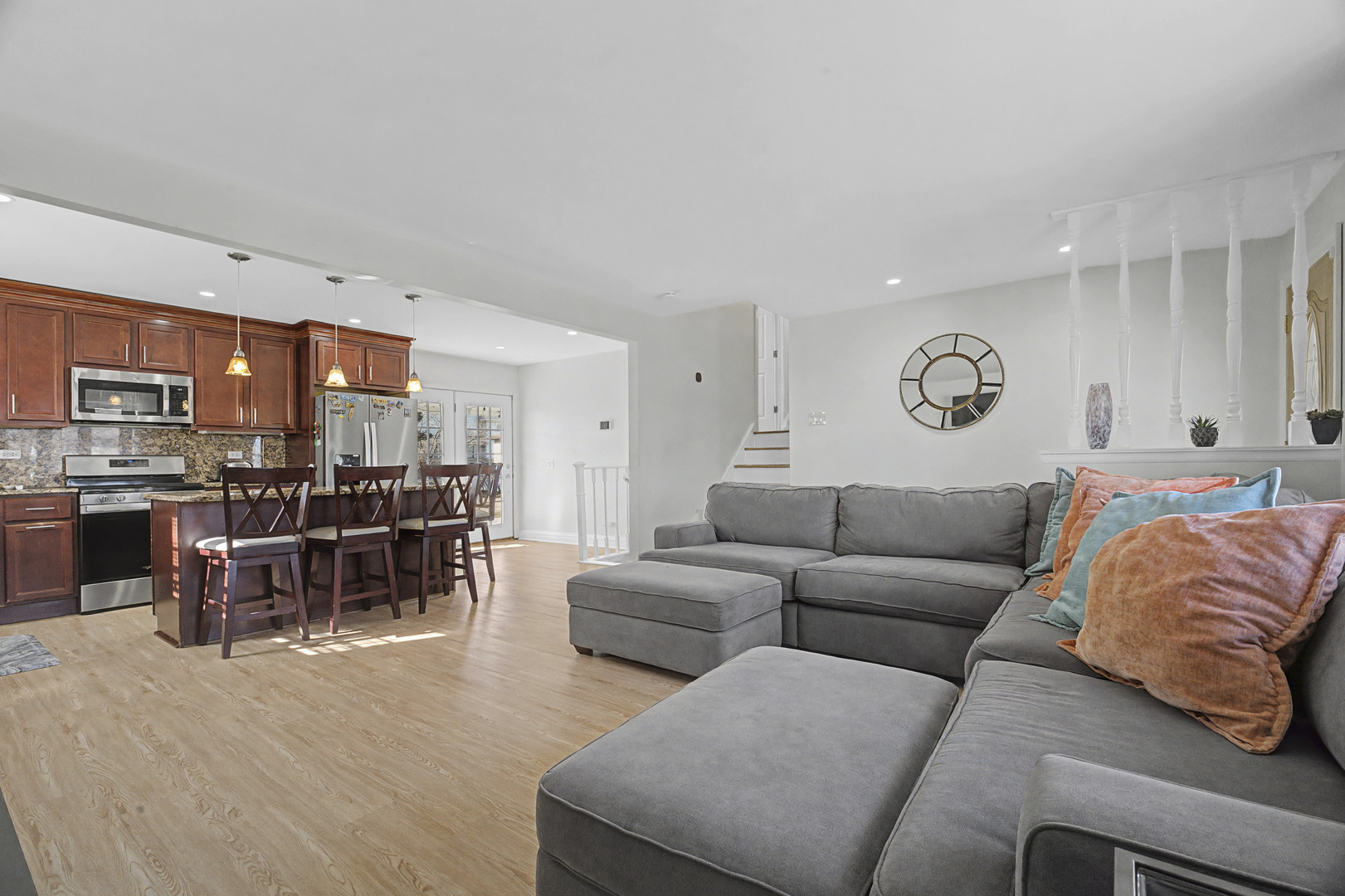 102 South Adeline Avenue Addison, IL 60101 - Photo 9 of 20 a living room with furniture and kitchen view