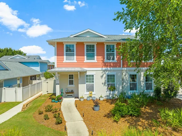 a front view of a house with swimming pool