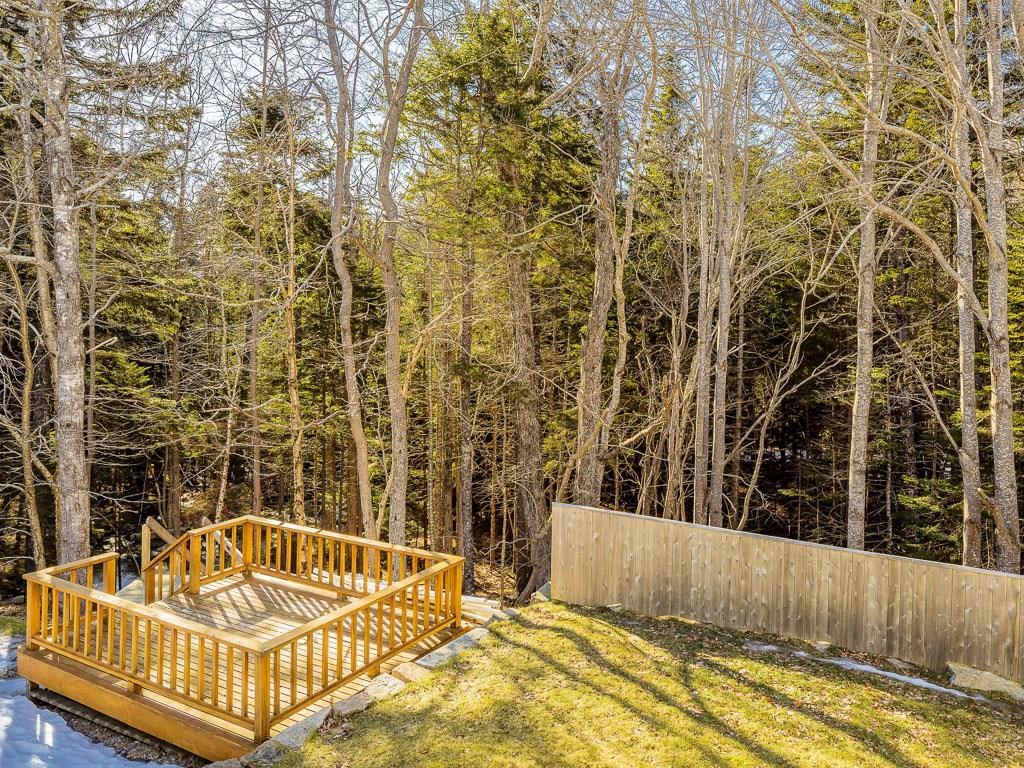 40 Jordan Pond Road Seal Harbor, ME 04675 - Photo 6 of 32 A deck overlooks Acadia National...