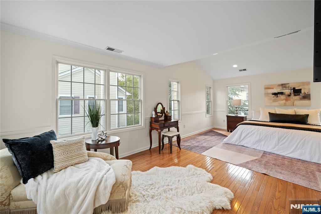 26 Chestnut Court Cedar Grove, NJ 07009 - Photo 19 of 42 a bedroom with a bed and a large window