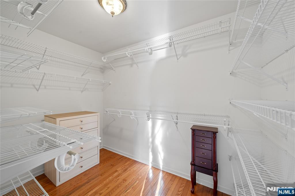 26 Chestnut Court Cedar Grove, NJ 07009 - Photo 23 of 42 a view of a room with racks on the wall