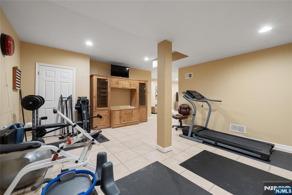 26 Chestnut Court Cedar Grove, NJ 07009 - Photo 38 of 42 a view of a room with gym equipment