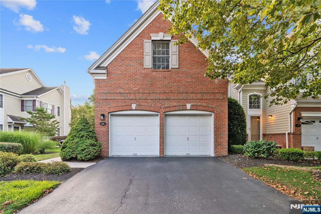 26 Chestnut Court Cedar Grove, NJ 07009 - Photo 41 of 42 a view of a house with a yard and garage