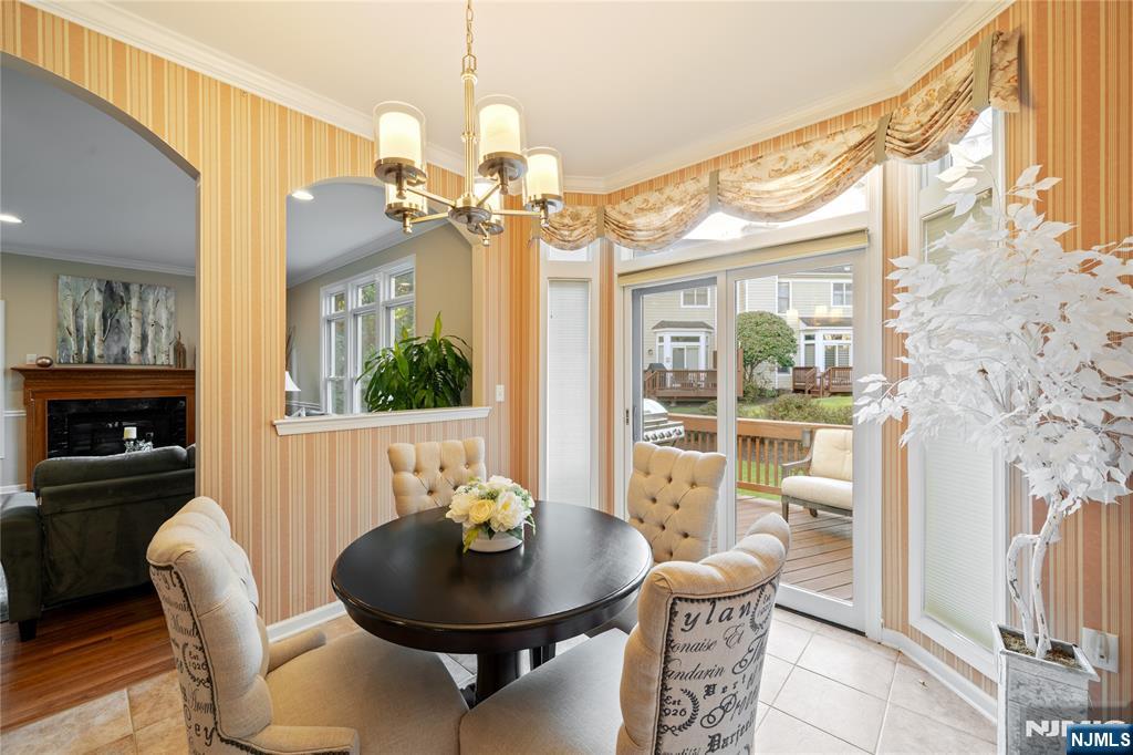 26 Chestnut Court Cedar Grove, NJ 07009 - Photo 10 of 42 a view of a dining room with furniture window and outside view