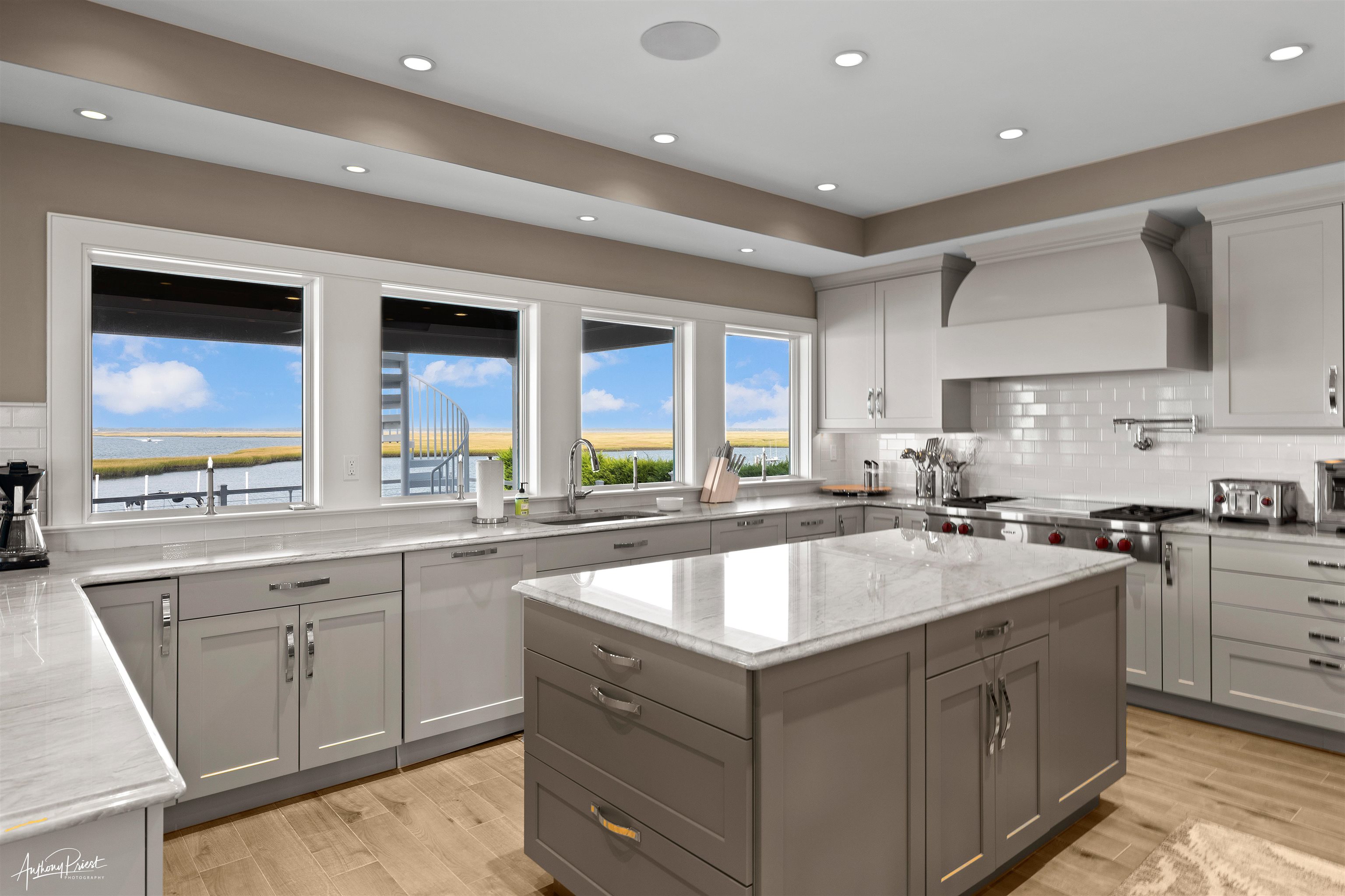 7668 Sunset Drive Avalon, NJ 08202 - Photo 25 of 49 a large white kitchen with a large window