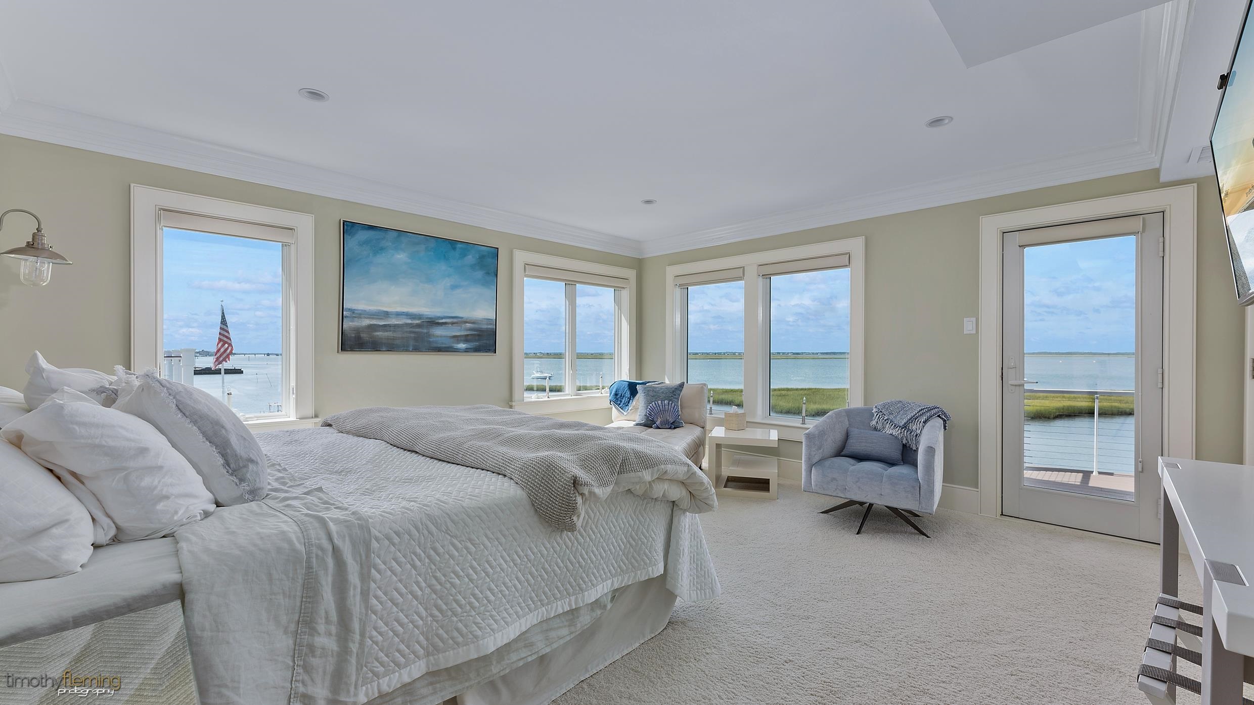 7668 Sunset Drive Avalon, NJ 08202 - Photo 27 of 49 a bedroom with furniture and a large window