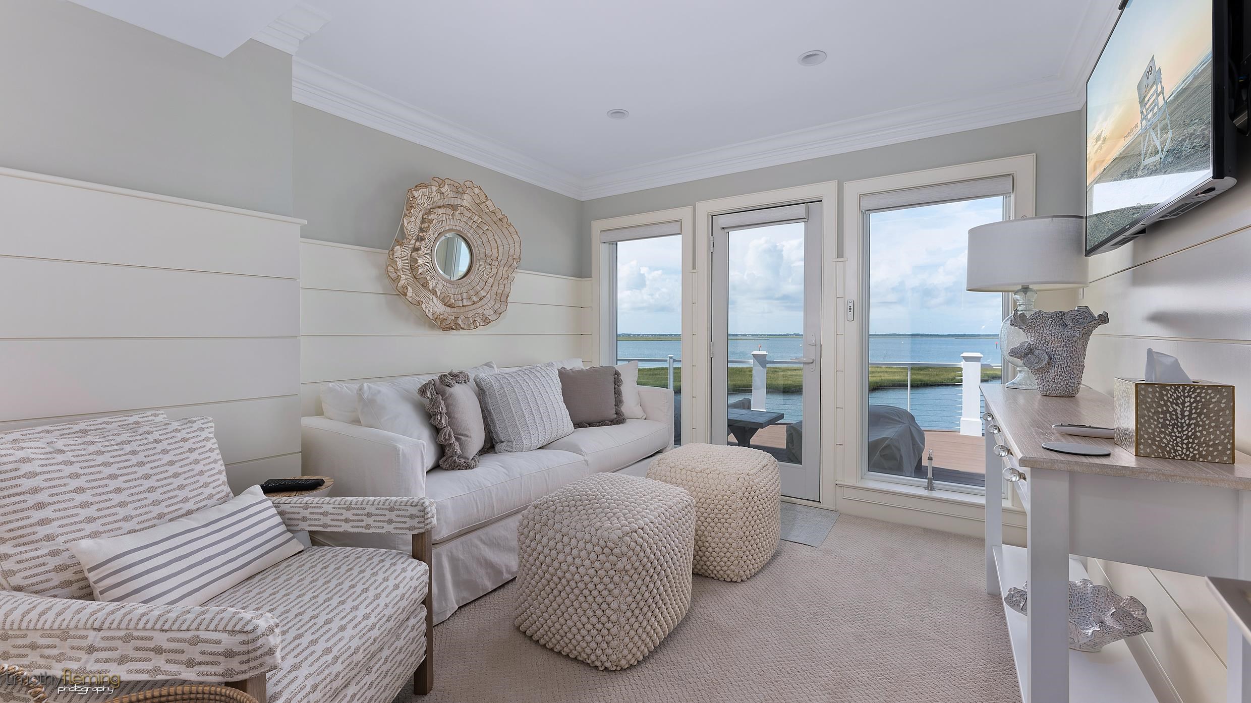 7668 Sunset Drive Avalon, NJ 08202 - Photo 28 of 49 a bedroom with a bed and a large window