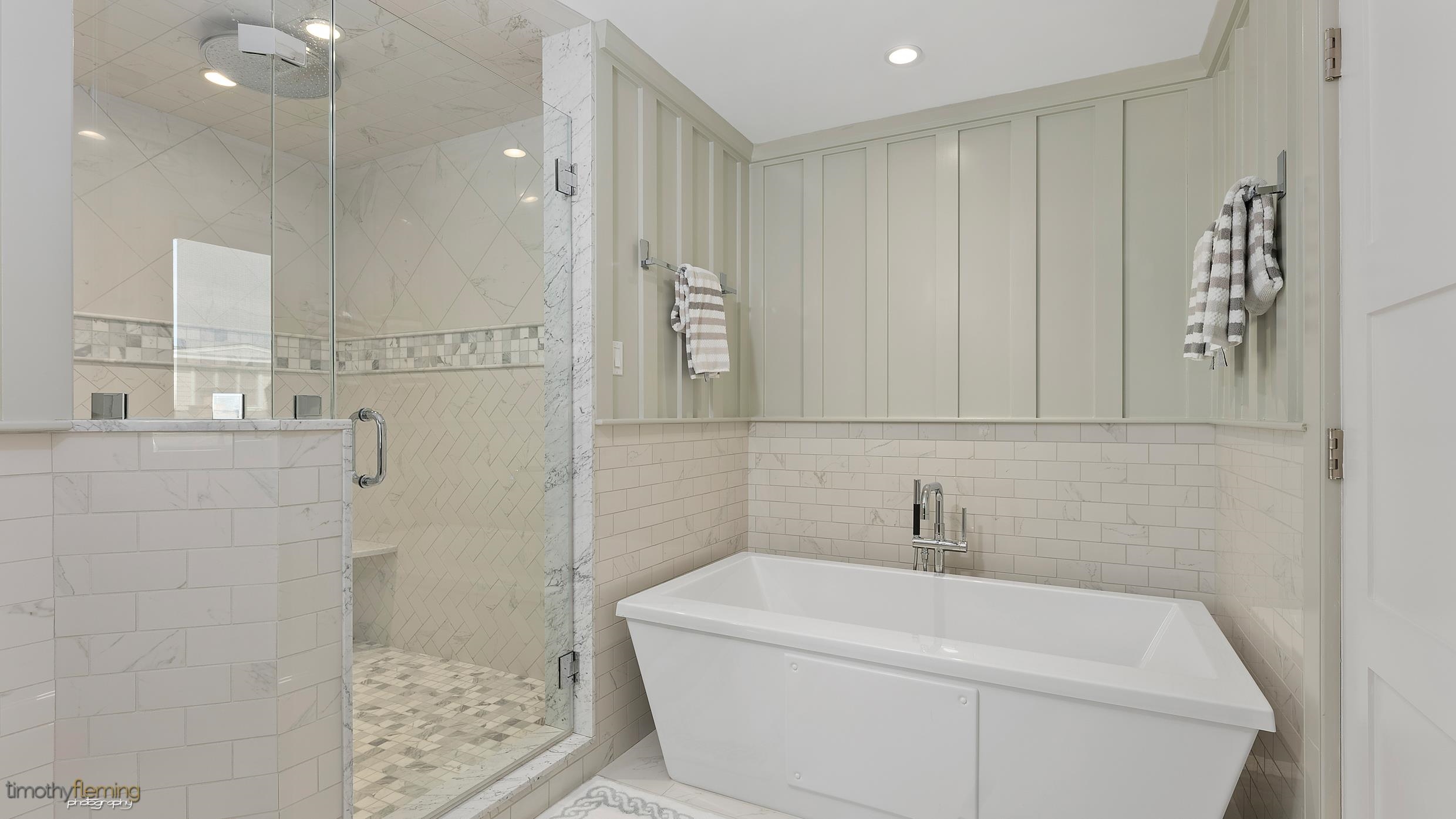 7668 Sunset Drive Avalon, NJ 08202 - Photo 32 of 49 a bathroom with a sink a toilet and shower