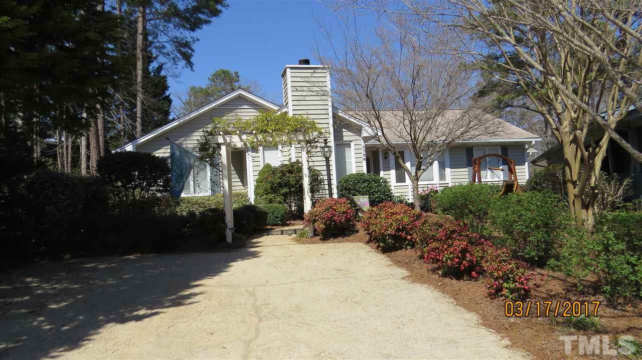 2758 Rue Sans Famille Raleigh, NC 27607 - Photo 1 of 12 a view of a house with a yard