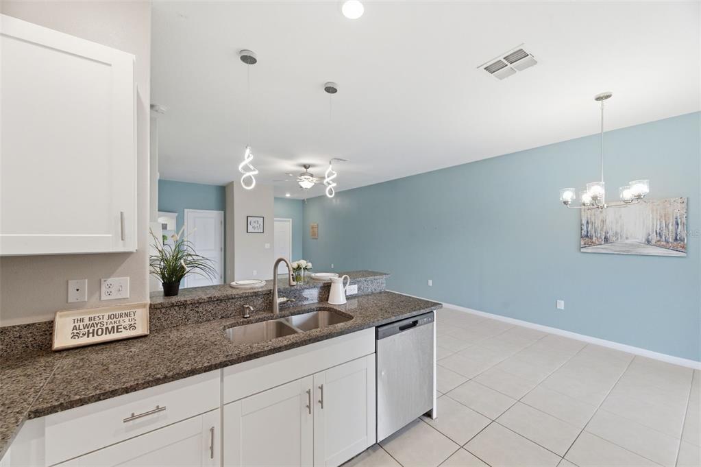 8606 Reedville Street New Port Richey, FL 34654 - Photo 17 of 100 a bathroom with a sink and a mirror