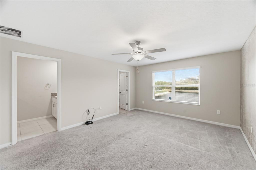 8606 Reedville Street New Port Richey, FL 34654 - Photo 30 of 100 a view of an empty room with a window