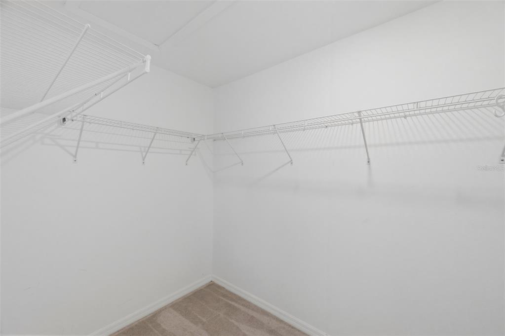 8606 Reedville Street New Port Richey, FL 34654 - Photo 33 of 100 a view of a room with racks on the wall