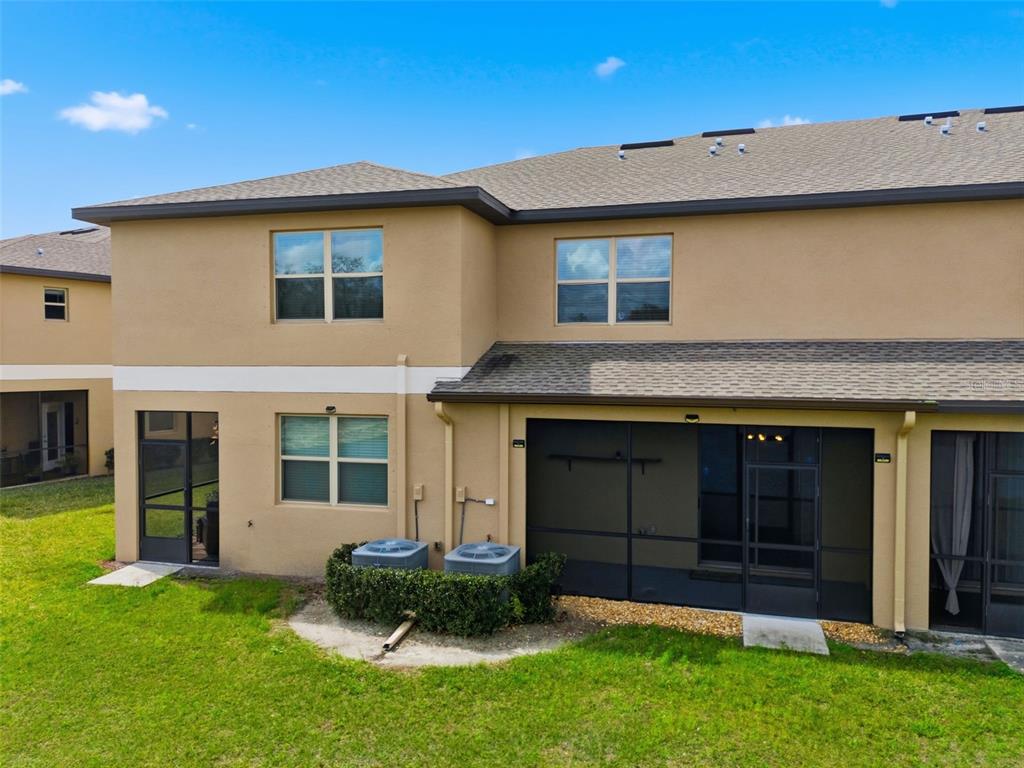 8606 Reedville Street New Port Richey, FL 34654 - Photo 69 of 100 a view of a house with a yard