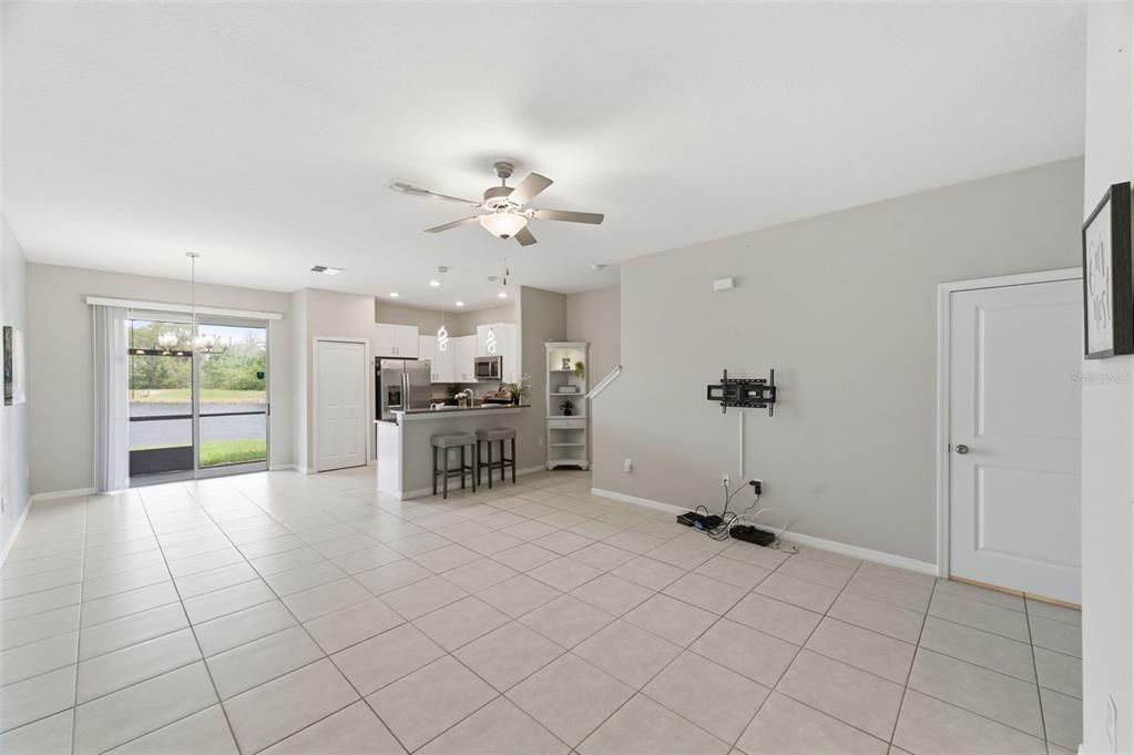 8606 Reedville Street New Port Richey, FL 34654 - Photo 9 of 100 a view of a livingroom with furniture and a table chair