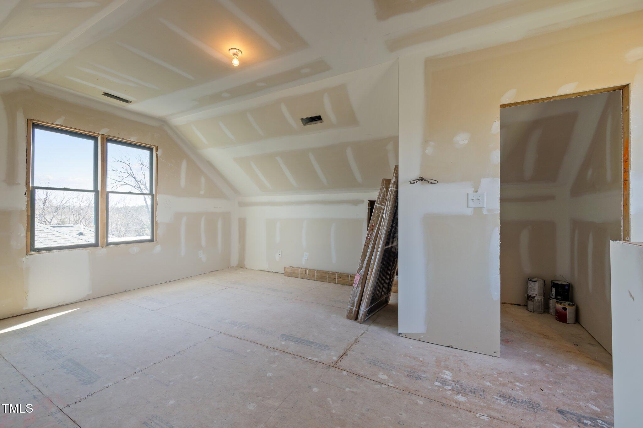 608 Dowd Street Durham, NC 27701 - Photo 19 of 24 an empty room with windows