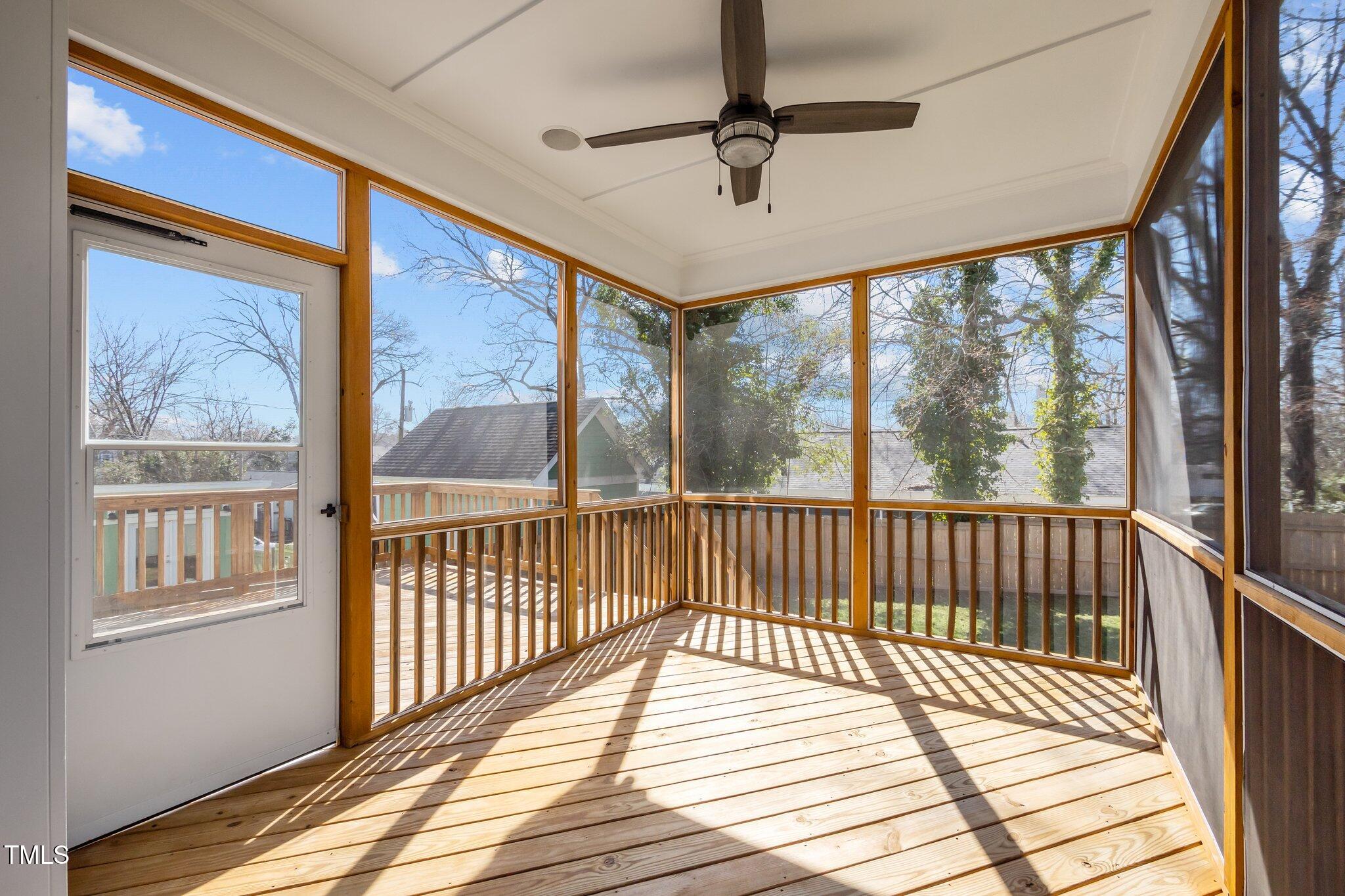 608 Dowd Street Durham, NC 27701 - Photo 22 of 24 a view of a balcony with wooden floor