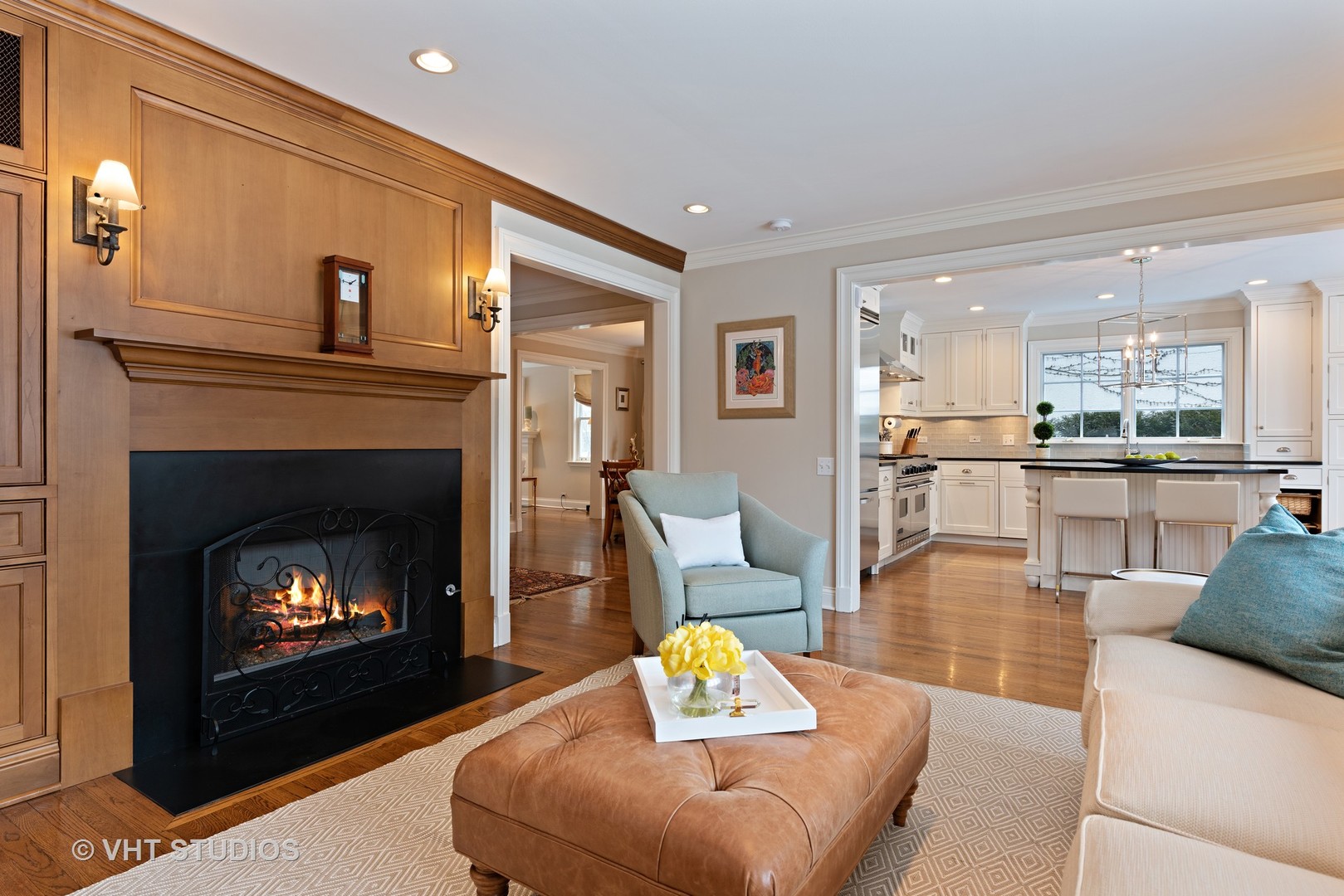 1075 Elm Street Winnetka, IL 60093 - Photo 12 of 40 a living room with furniture and a fireplace