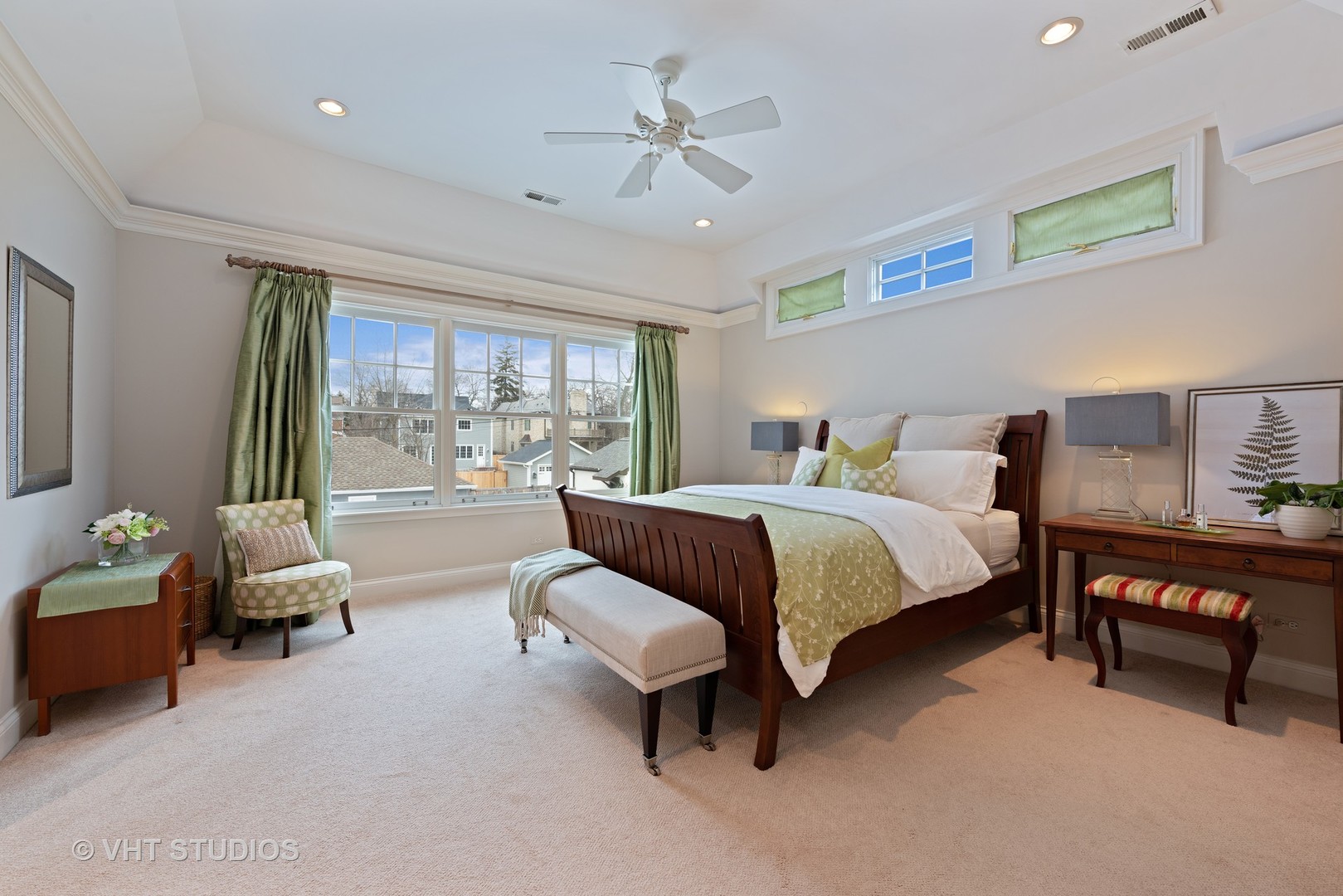 1075 Elm Street Winnetka, IL 60093 - Photo 17 of 40 a bedroom with a bed and a couch