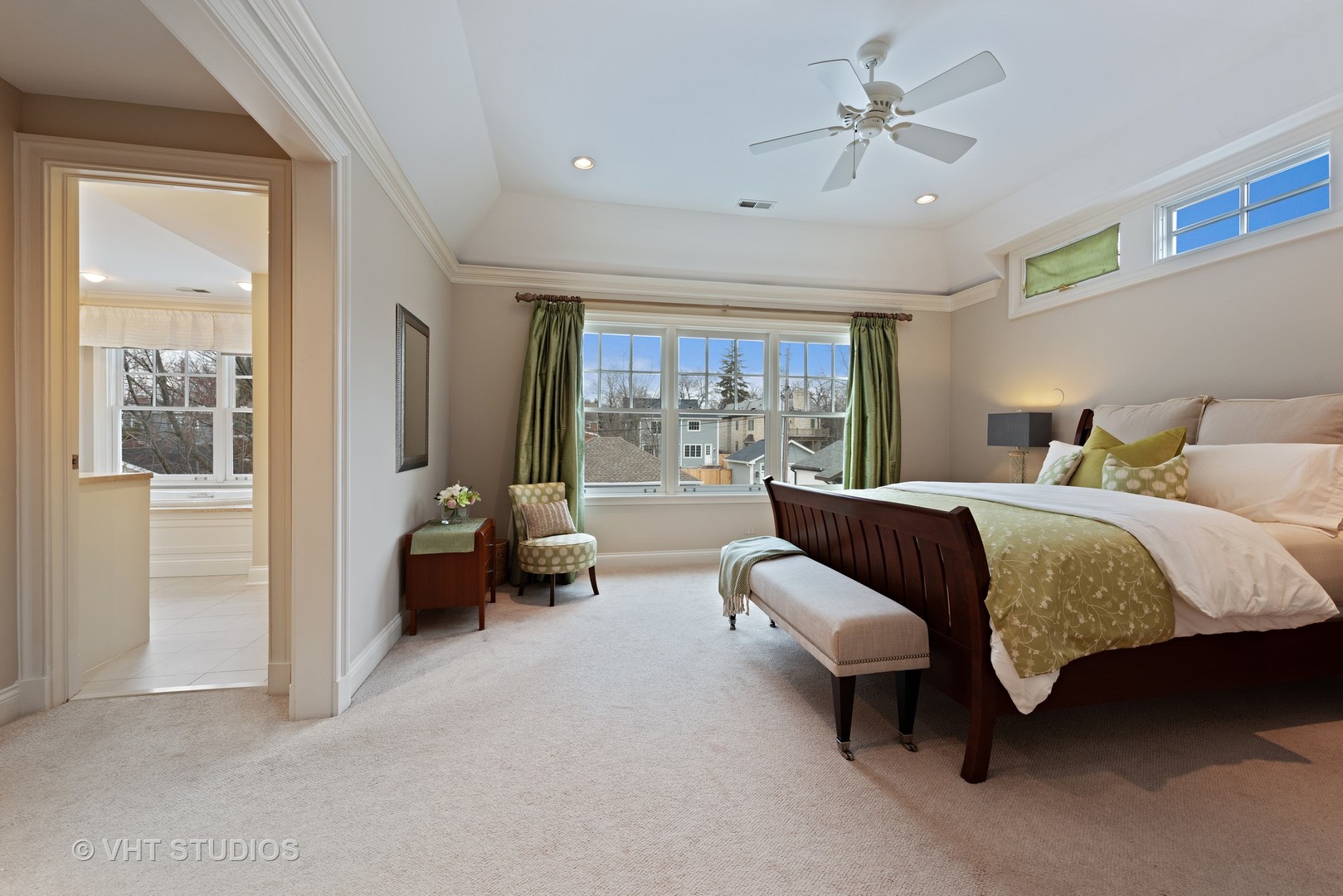 1075 Elm Street Winnetka, IL 60093 - Photo 19 of 40 a spacious bedroom with a bed and glass walk in closet