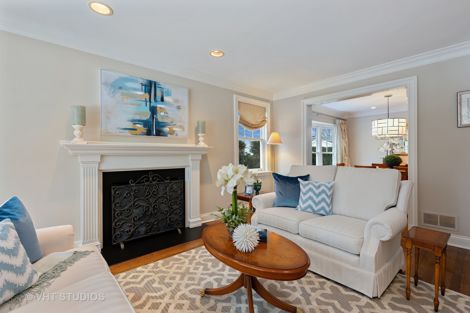 1075 Elm Street Winnetka, IL 60093 - Photo 3 of 40 a living room with furniture and a fireplace