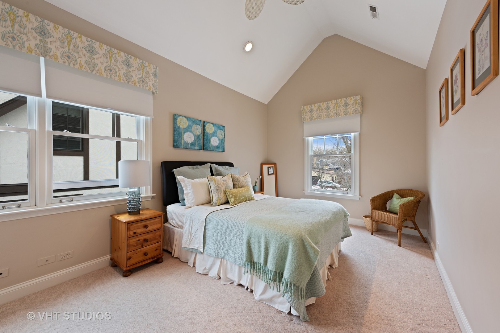 1075 Elm Street Winnetka, IL 60093 - Photo 23 of 40 a bedroom with a bed and wooden floor