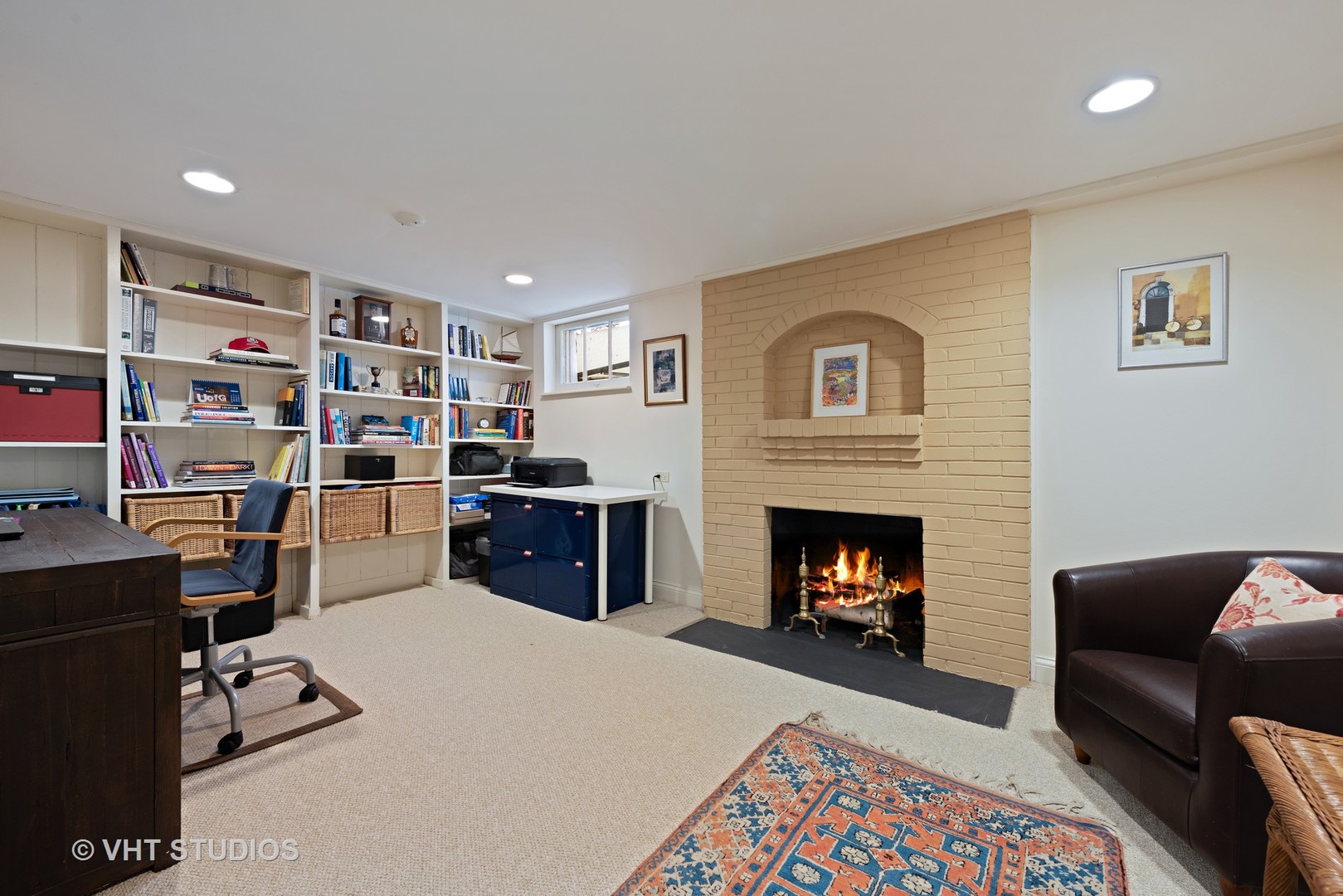 1075 Elm Street Winnetka, IL 60093 - Photo 31 of 40 a living room with furniture a fireplace and a piano