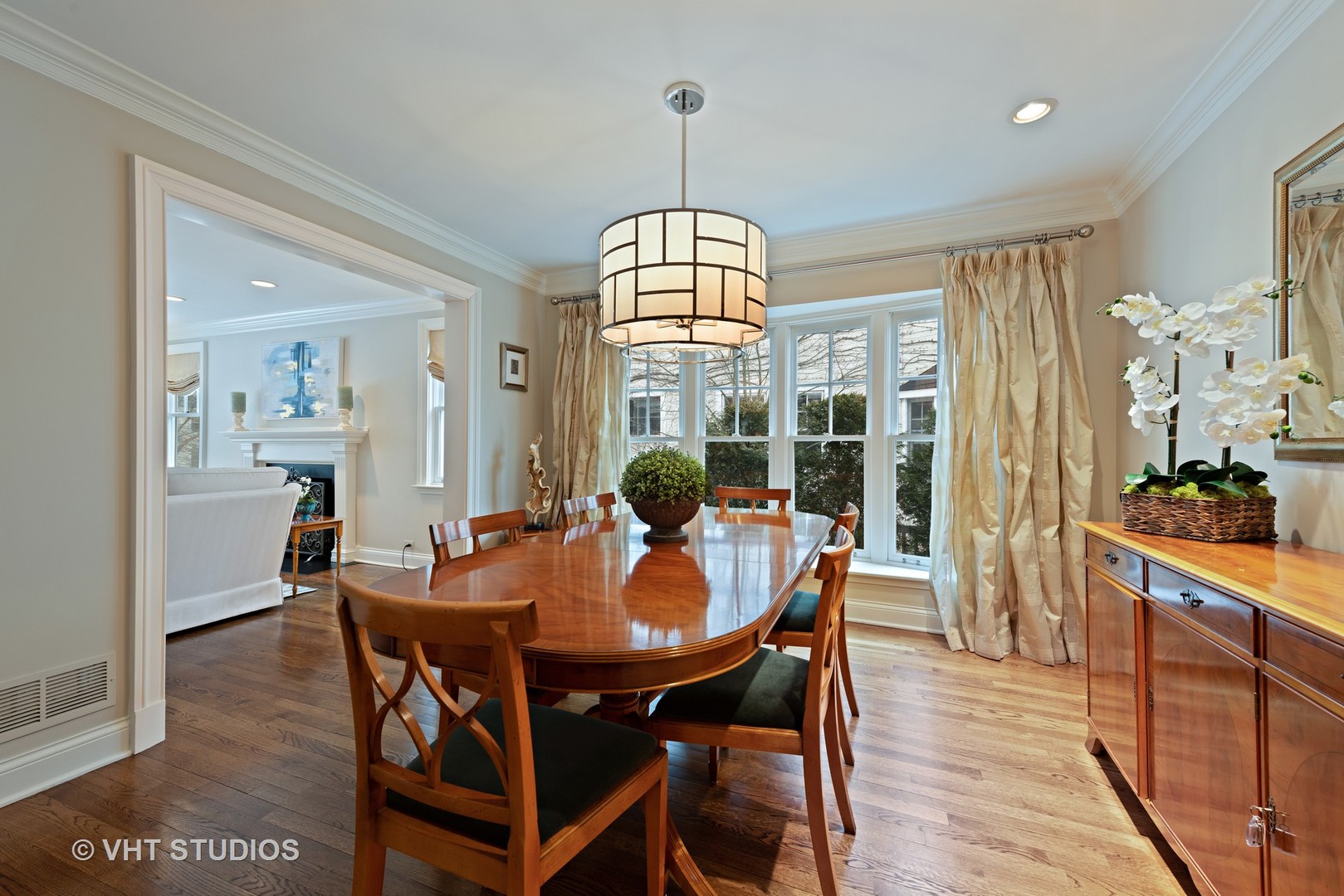 1075 Elm Street Winnetka, IL 60093 - Photo 5 of 40 a view of a dining room with furniture window and wooden floor