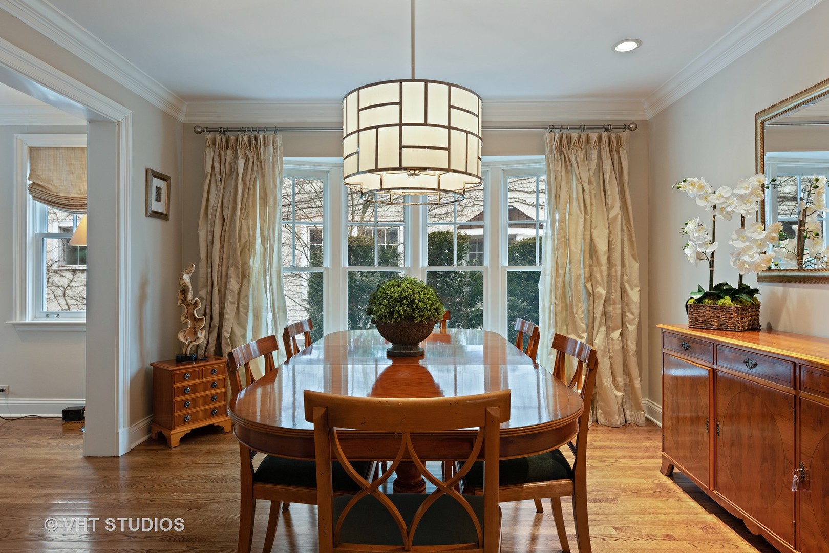 1075 Elm Street Winnetka, IL 60093 - Photo 6 of 40 a view of a dining room with furniture window and wooden floor