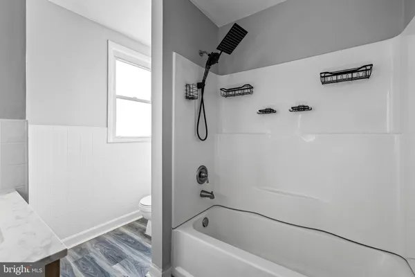 a bathroom with a bathtub