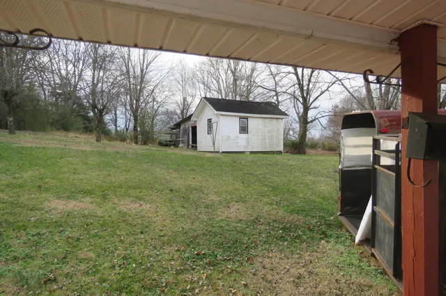 a view of balcony with wooden floor