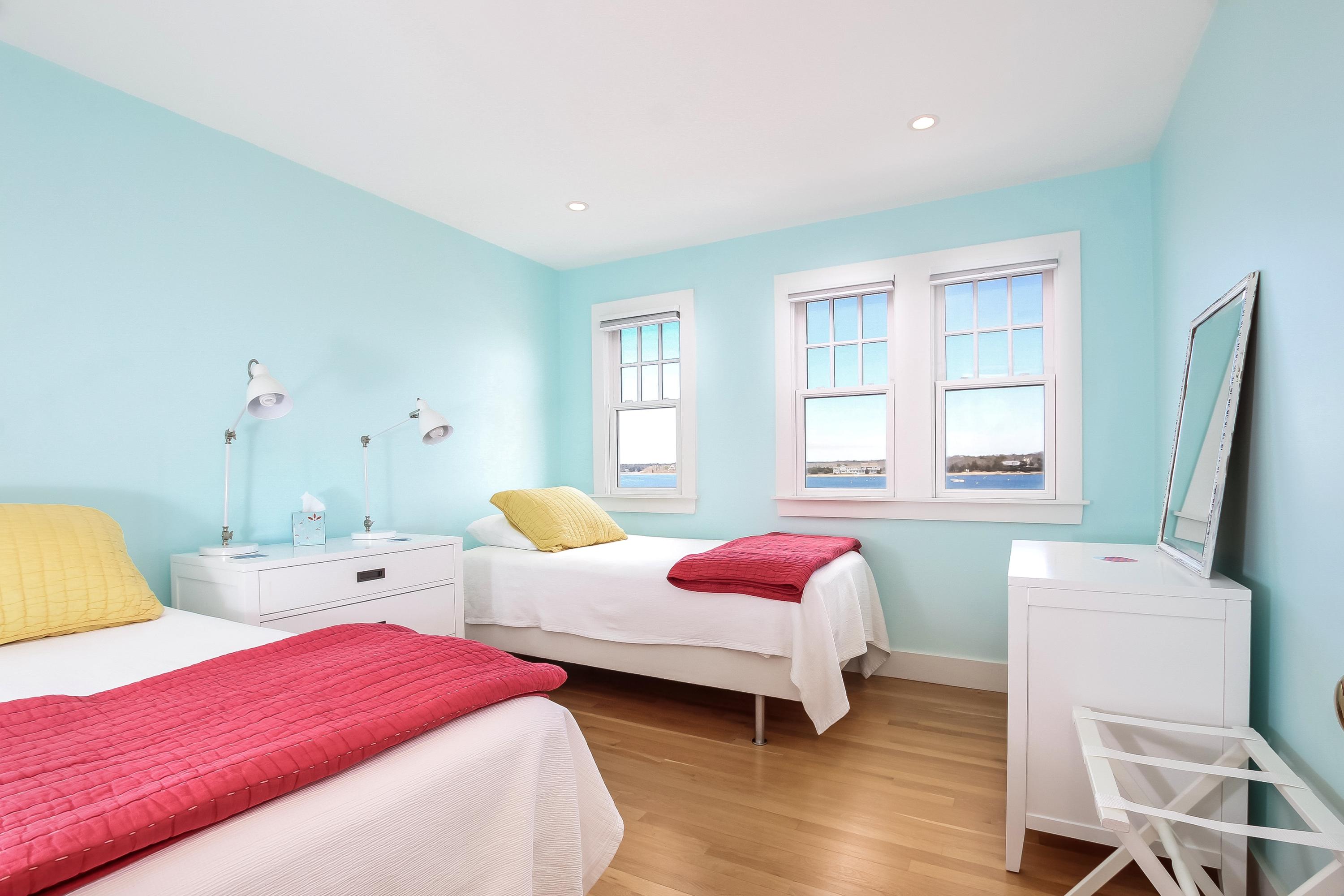 352 Scraggy Neck Road Cataumet, MA 02534 - Photo 13 of 36 a bedroom with two beds and a window