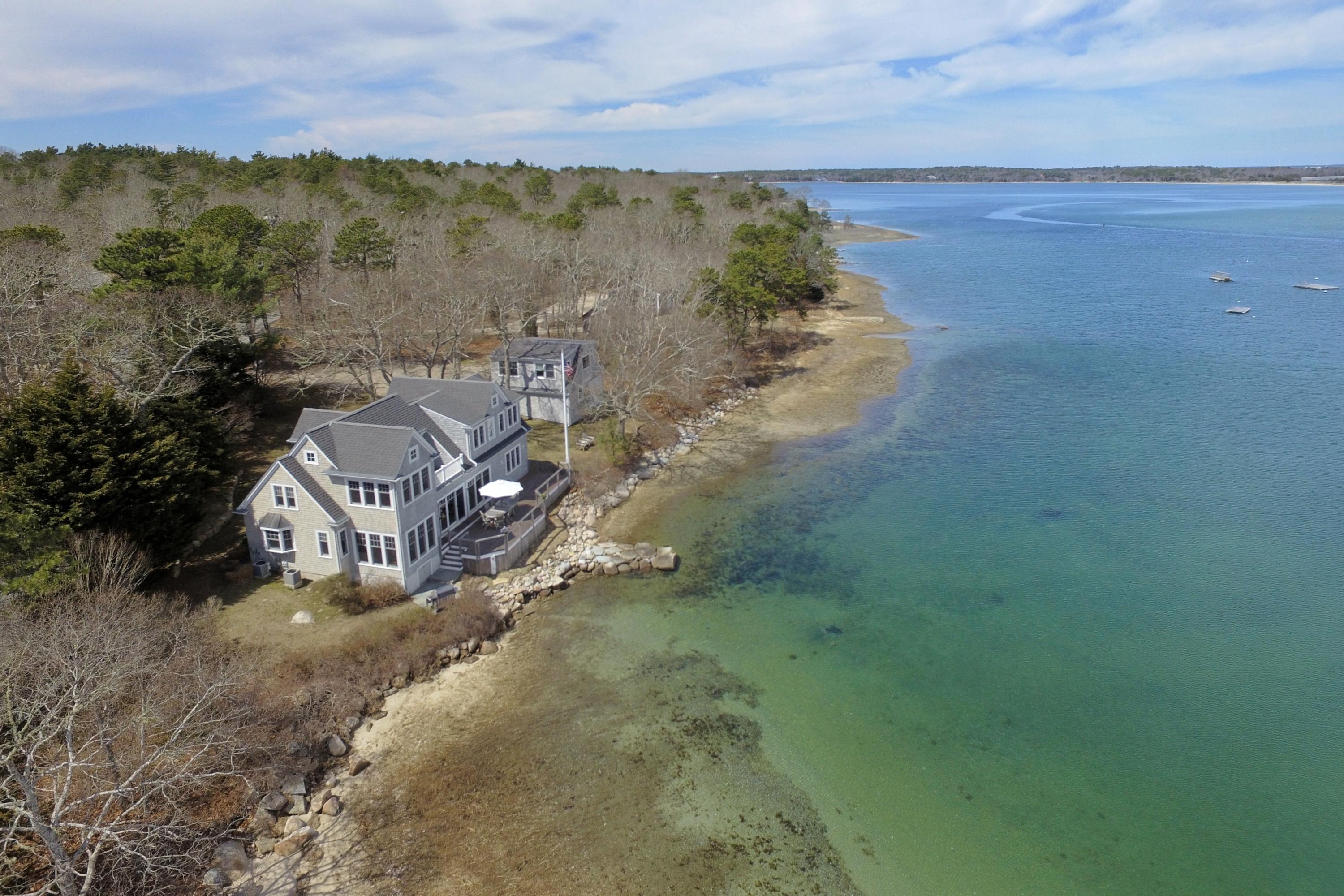 352 Scraggy Neck Road Cataumet, MA 02534 - Photo 23 of 36 a view of a lake with mountain