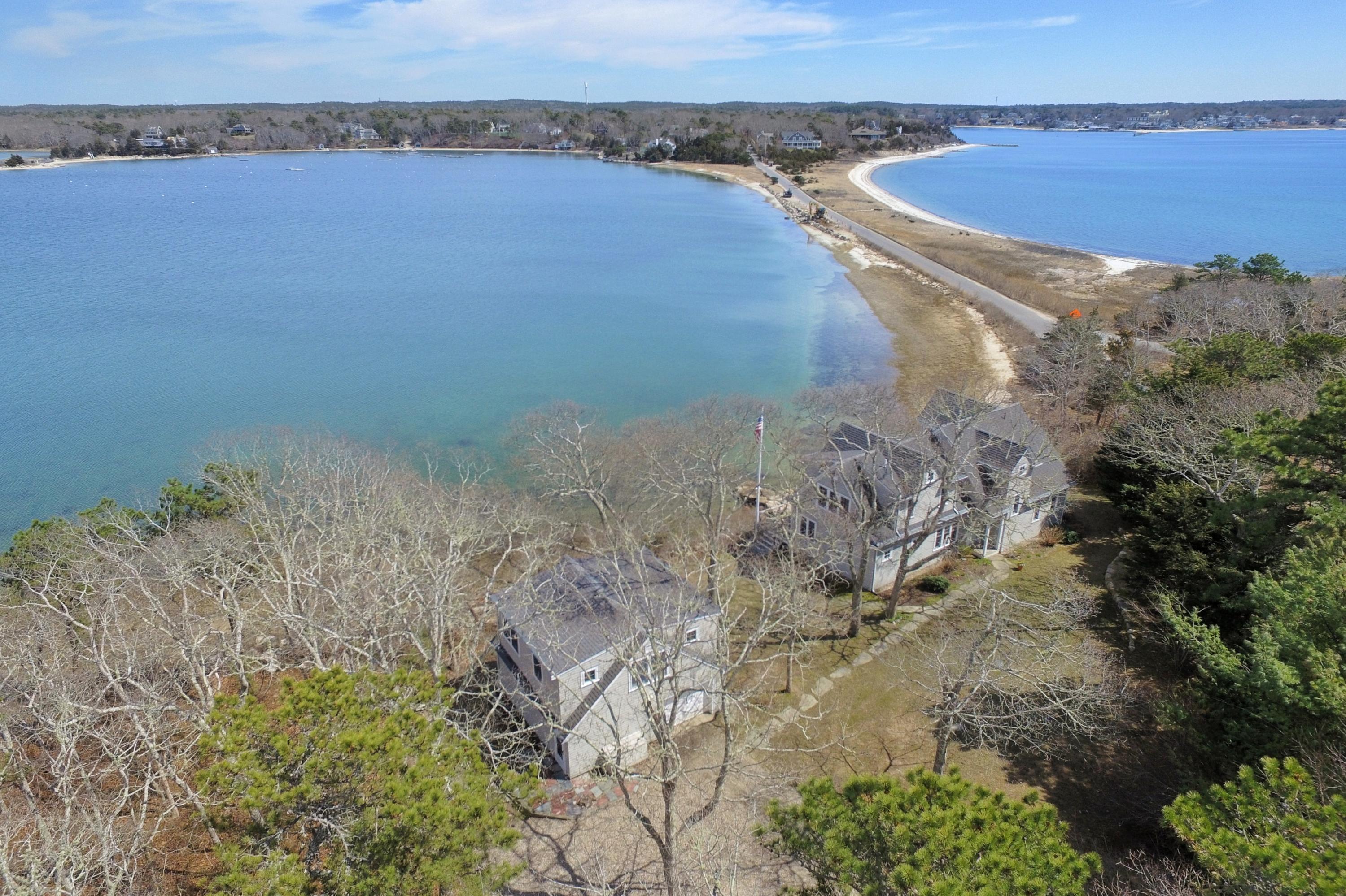 352 Scraggy Neck Road Cataumet, MA 02534 - Photo 25 of 36 a view of a dry yard with wooden floor and lake view