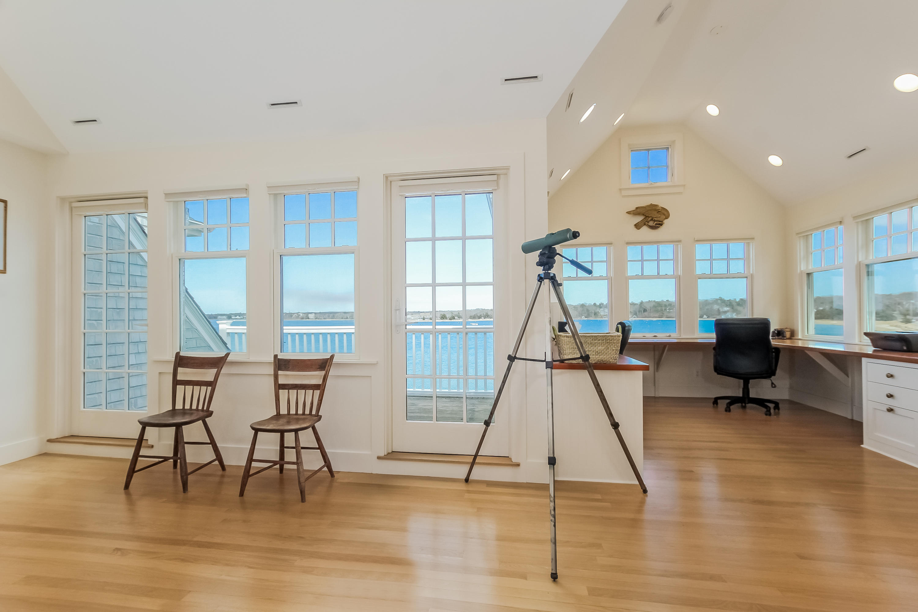 352 Scraggy Neck Road Cataumet, MA 02534 - Photo 9 of 36 a view of a room with furniture and wooden floor