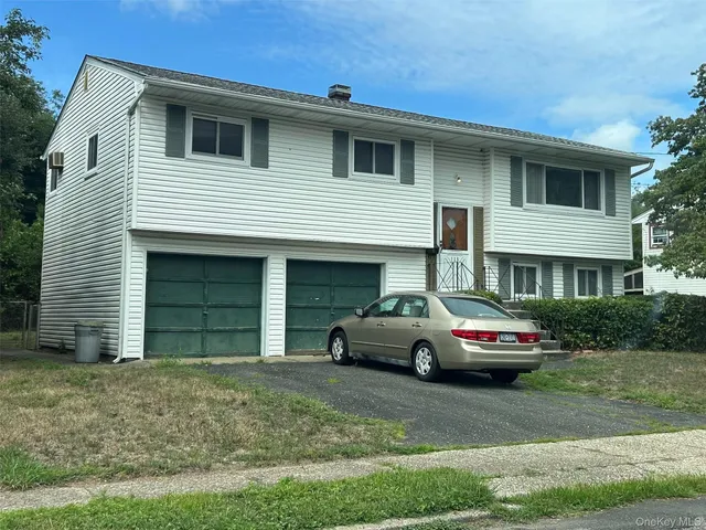 a car parked in front of a house