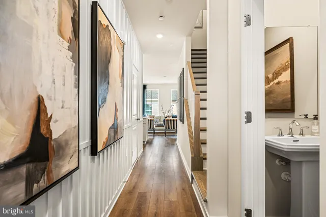 a view of a bathroom with a tub and mirror