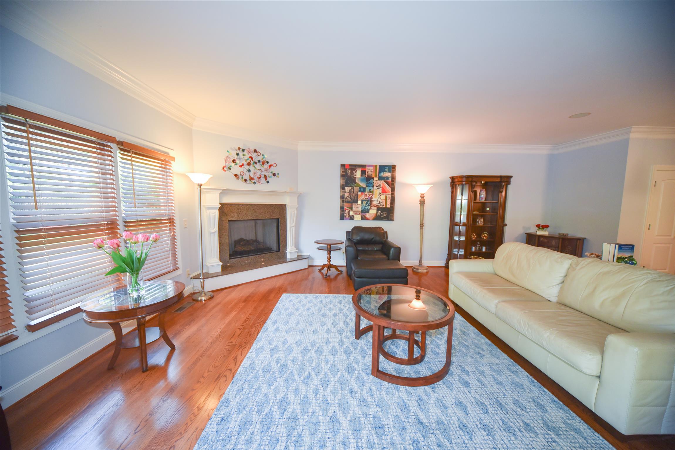 388 Sandcastle Road Franklin, TN 37069 - Photo 3 of 30 Living Room with pool view & gas fireplace