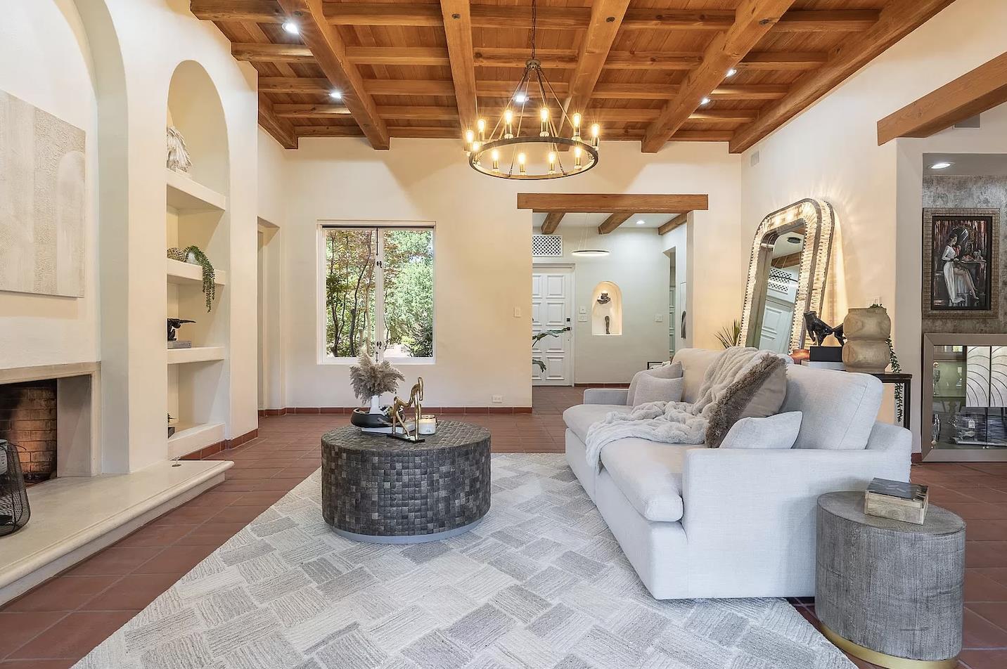 12 Vineyard Hill Road Woodside, CA 94062 - Photo 3 of 21 a living room with furniture and a chandelier