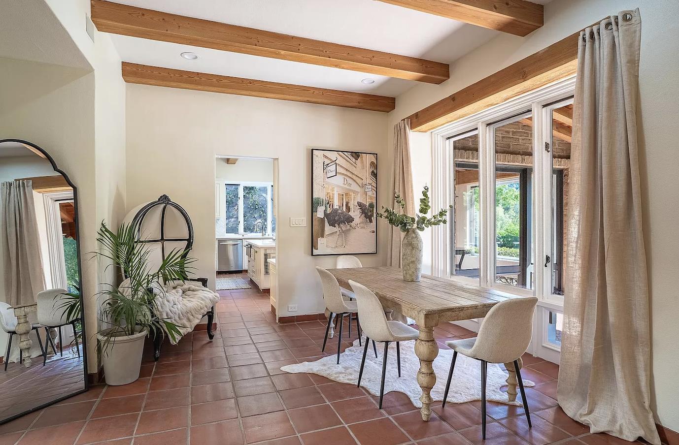 12 Vineyard Hill Road Woodside, CA 94062 - Photo 4 of 21 a view of a dining room with furniture and a window