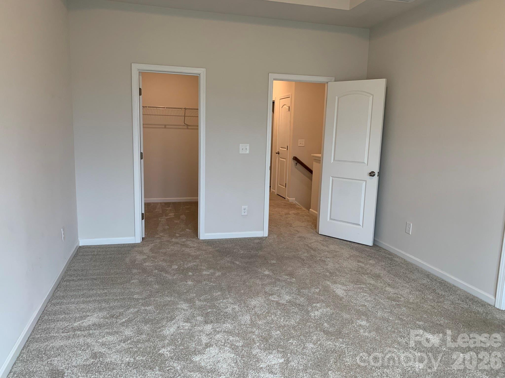 2143 Stevens Mill Road Matthews, NC 28104 - Photo 24 of 39 an empty room with closet area