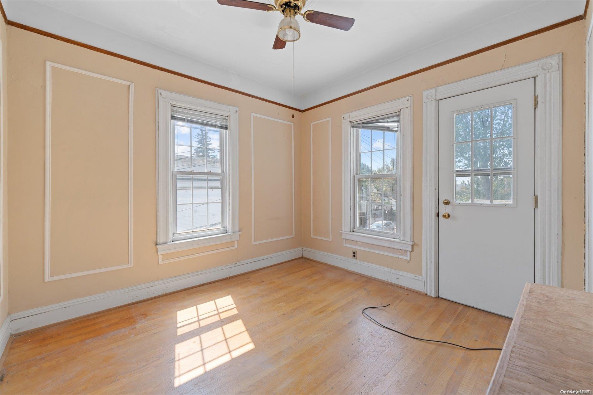 85-70 79th Street Queens, NY 11421 - Photo 11 of 18 a view of an empty room with a window