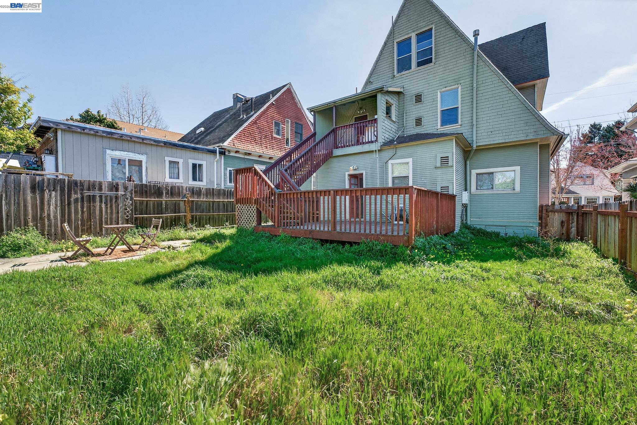 1835 Prince Street, Unit A Berkeley, CA 94703 - Photo 22 of 23 a view of a house with a yard
