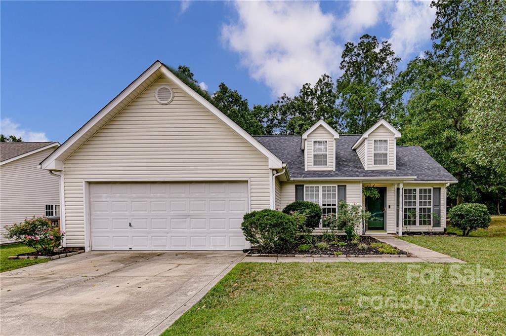 2215 Genesis Drive Monroe, NC 28110 - Photo 1 of 29 a front view of a house with a yard