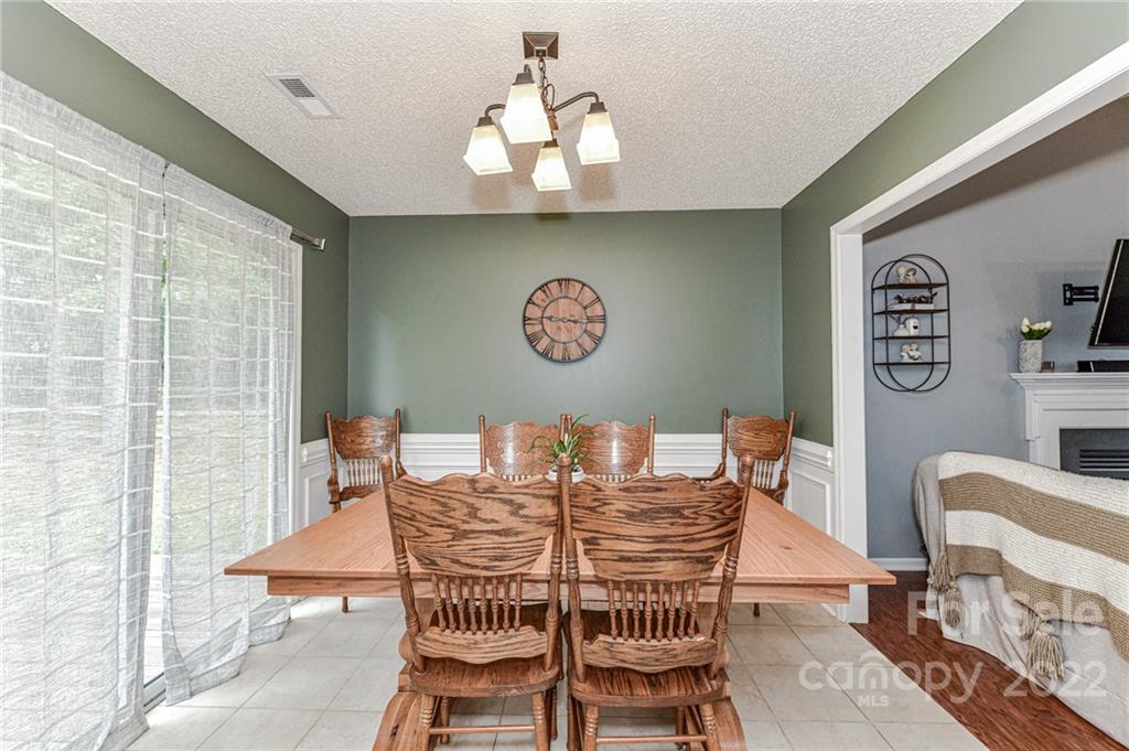 2215 Genesis Drive Monroe, NC 28110 - Photo 12 of 29 a view of a dining room with furniture