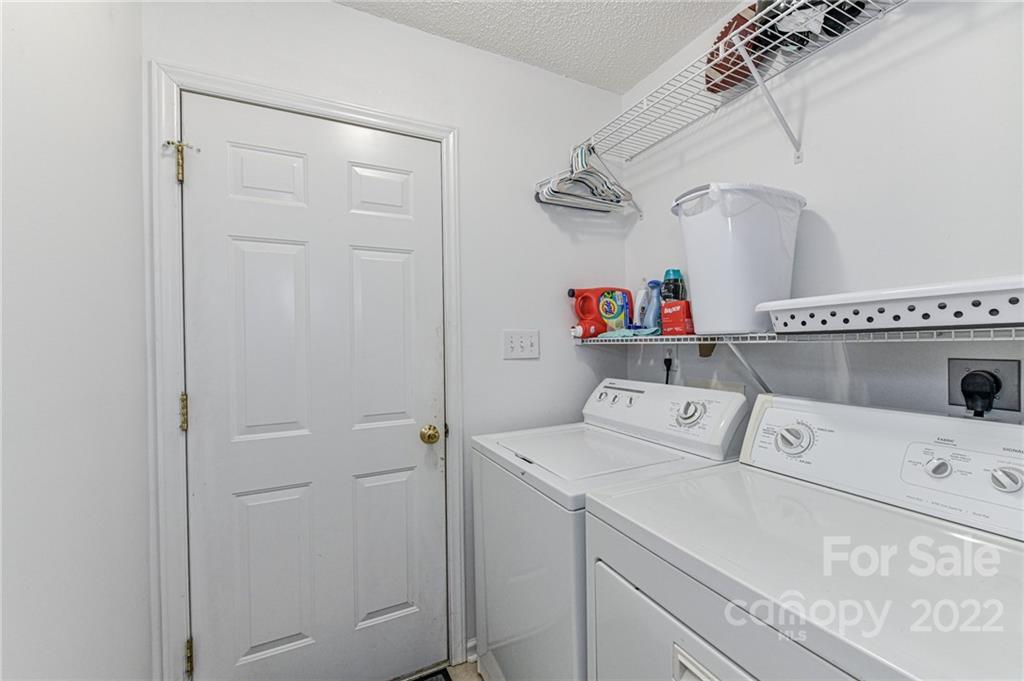 2215 Genesis Drive Monroe, NC 28110 - Photo 22 of 29 a utility room with dryer and washer