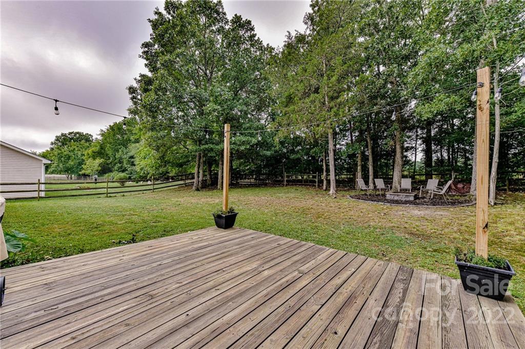 2215 Genesis Drive Monroe, NC 28110 - Photo 23 of 29 a view of a backyard with wooden floor