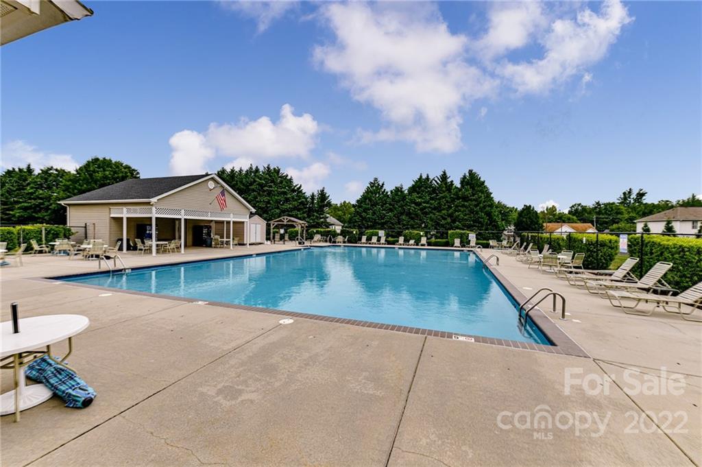 2215 Genesis Drive Monroe, NC 28110 - Photo 29 of 29 a view of house with swimming pool and outdoor seating