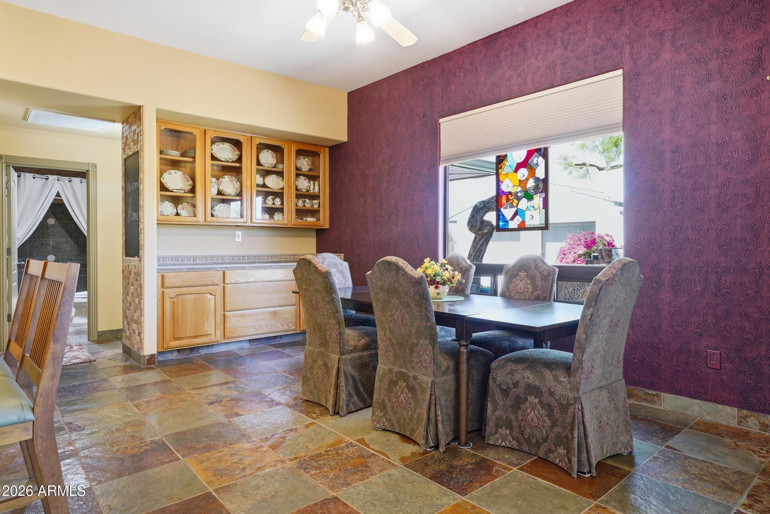 6334 East Albany Street Mesa, AZ 85205 - Photo 23 of 72 a view of a dining room with furniture