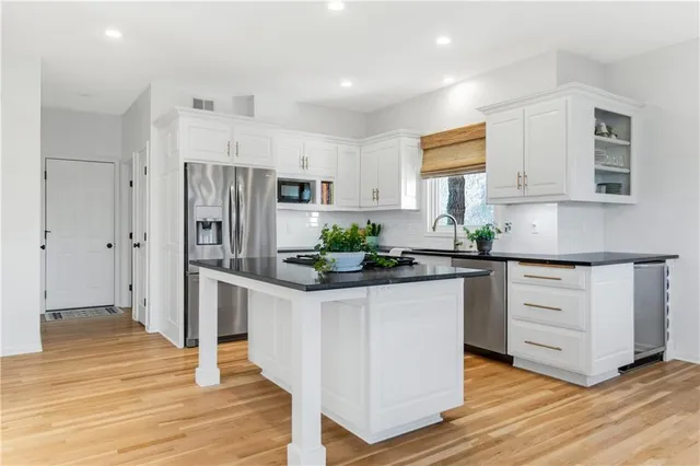 $515,000 | 506 East 122nd Street, Kansas City, MO 64145