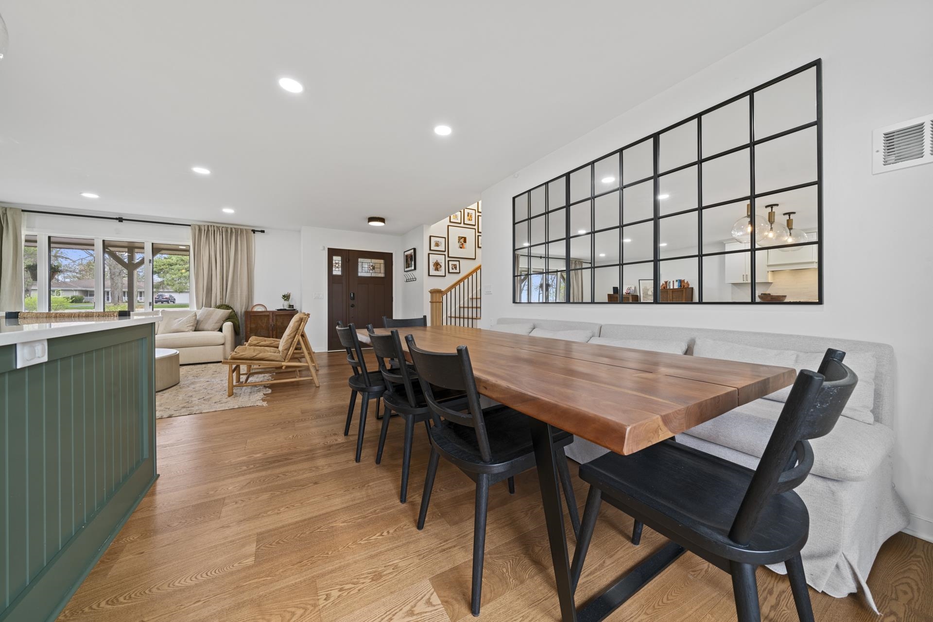 3075 East Water Road Byron, IL 61010 - Photo 14 of 46 a dining room with a table and chairs